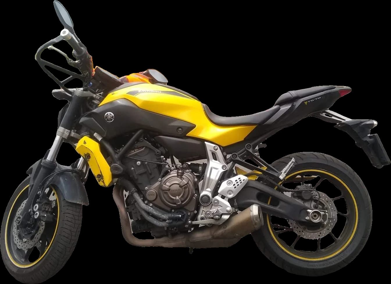 Moto naked amarilla de media cilindrada vista de lado